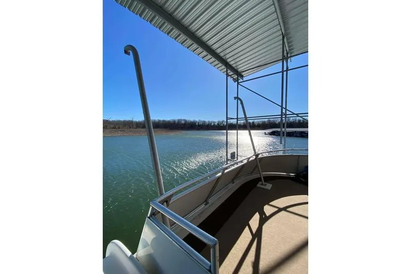 Slide: The Image of Slide on Summerset houseboat, 21' x 106', 2007 model, leading into water. - 154