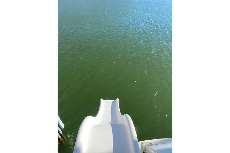 Slide: The Image of Luxurious bedroom interior in 2007 Summerset houseboat with wood flooring and built-in TV. - 17