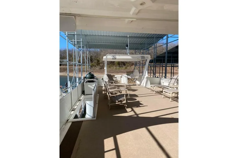 Slide: The Image of Luxurious wooden hallway interior of 2007 Summerset 21' x 106' model houseboat. - 18