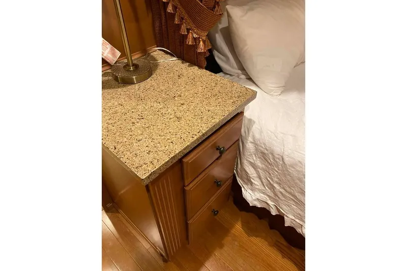 Slide: The Image of Carpeted interior corner of a 2007 Summerset model, featuring a door and hatch. - 187