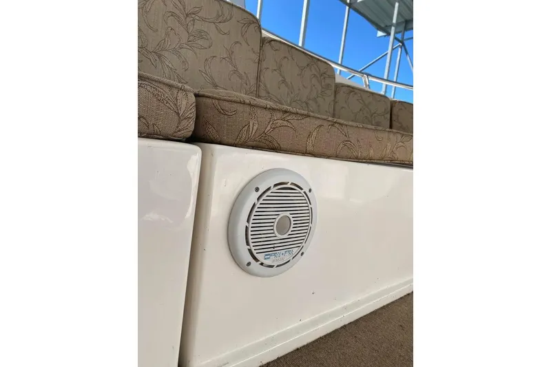 Slide: The Image of White slide leading into calm green water from a 2007 Summerset houseboat. - 20