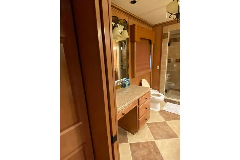 Slide: The Image of Luxurious bathroom in 2007 Summerset model, featuring elegant lighting and spacious shower. - 207