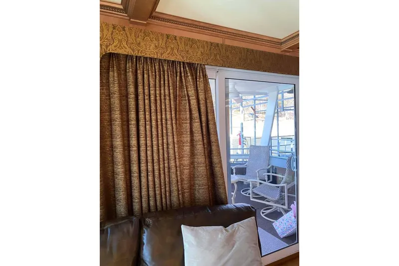 Slide: The Image of Spacious deck of 2007 Summerset houseboat with lounge chairs and canopy. - 21