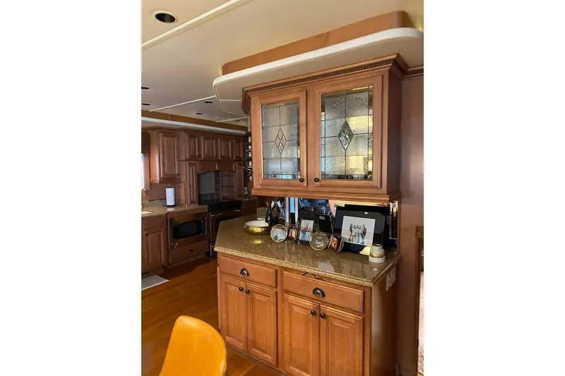 Slide: The Image of Spacious deck of 2007 Summerset houseboat with seating, overlooking serene water. - 22