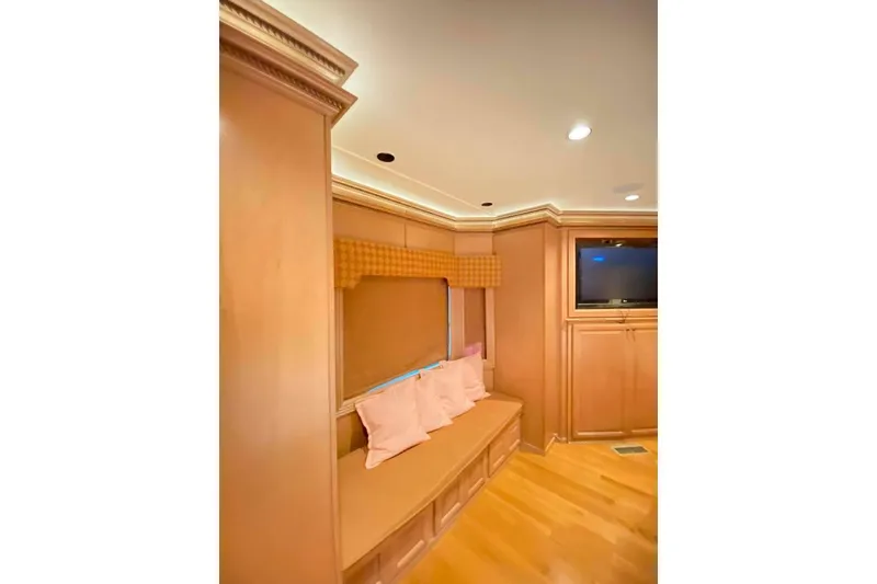 Slide: The Image of Luxurious bedroom in 2007 Summerset houseboat, featuring a cozy bed and elegant wood furnishings. - 221