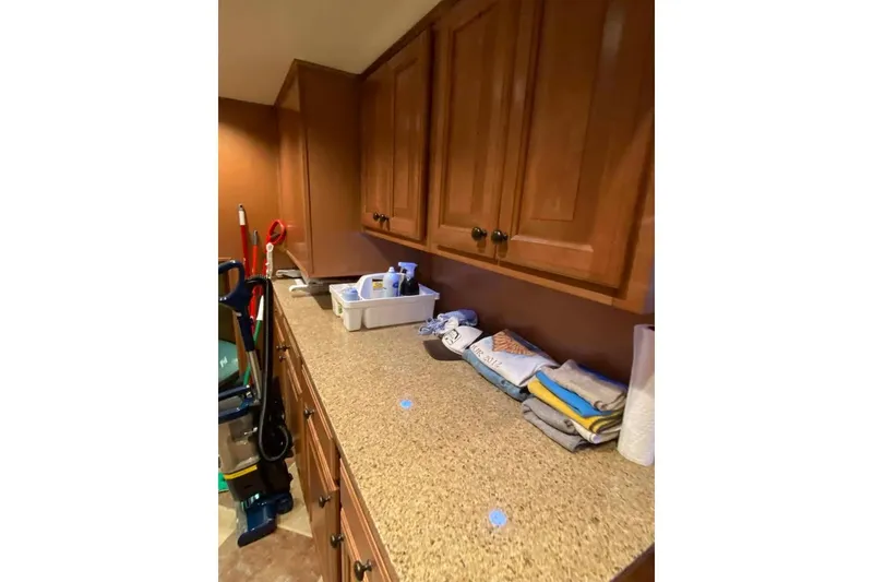 Slide: The Image of Interior of 2007 Summerset houseboat with built-in TV and wooden cabinetry. - 237