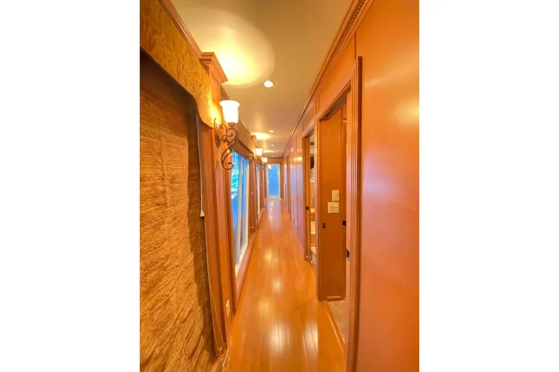 Slide: The Image of Laundry area in a 2007 Summerset 21' x 106' model with washer, dryer, and storage cabinets. - 241