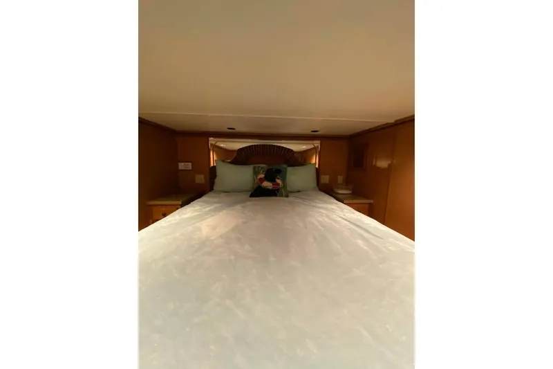 Slide: The Image of Luxurious interior of 2007 Summerset houseboat, featuring elegant wood paneling and large window. - 245