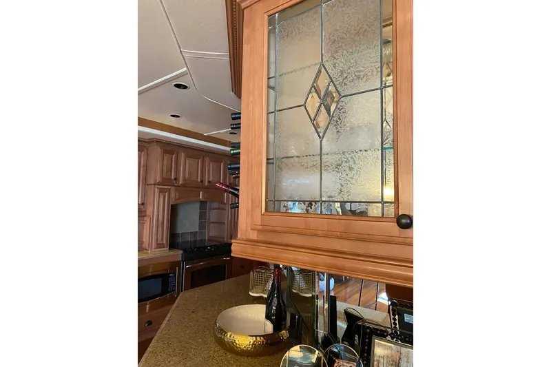 Slide: The Image of Luxurious wooden kitchen interior in 2007 Summerset 21' x 106' model. - 25