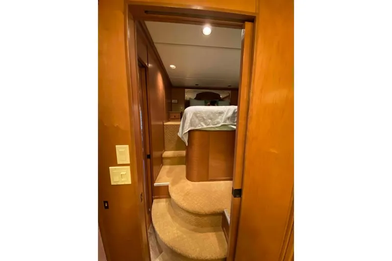 Slide: The Image of Compact bathroom in 2007 Summerset houseboat, featuring toilet, sink, and wooden cabinetry. - 253
