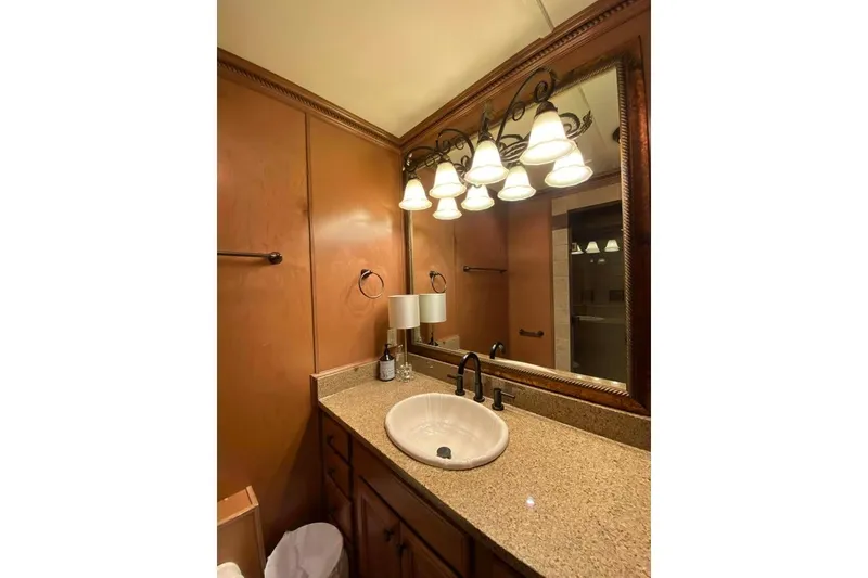 Slide: The Image of Luxurious bathroom in 2007 Summerset model, featuring glass shower and wooden accents. - 255