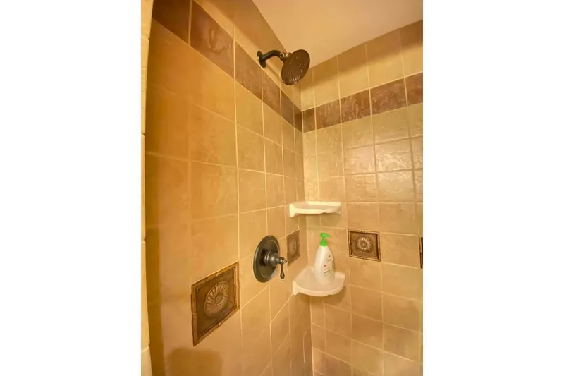 Slide: The Image of Interior of 2007 Summerset houseboat with wood paneling and wall-mounted TV. - 260