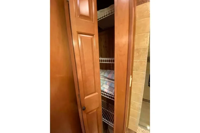 Slide: The Image of Carpeted stairs in a 2007 Summerset 21' x 106' model yacht interior. - 262