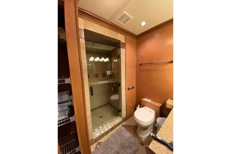 Slide: The Image of Wooden closet door in Summerset 21' x 106' houseboat, 2007 model, near tiled bathroom. - 266