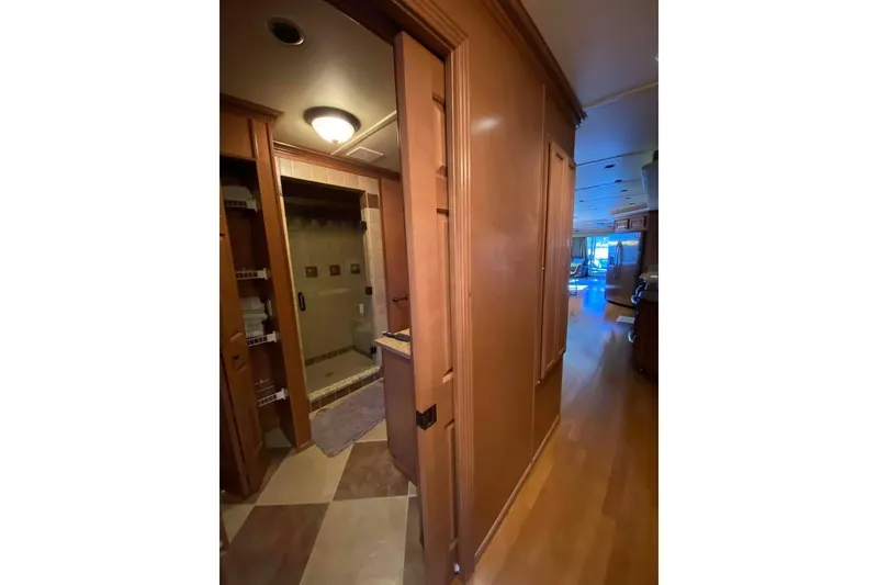 Slide: The Image of Interior of 2007 Summerset houseboat with wooden doors and carpeted stairs. - 267
