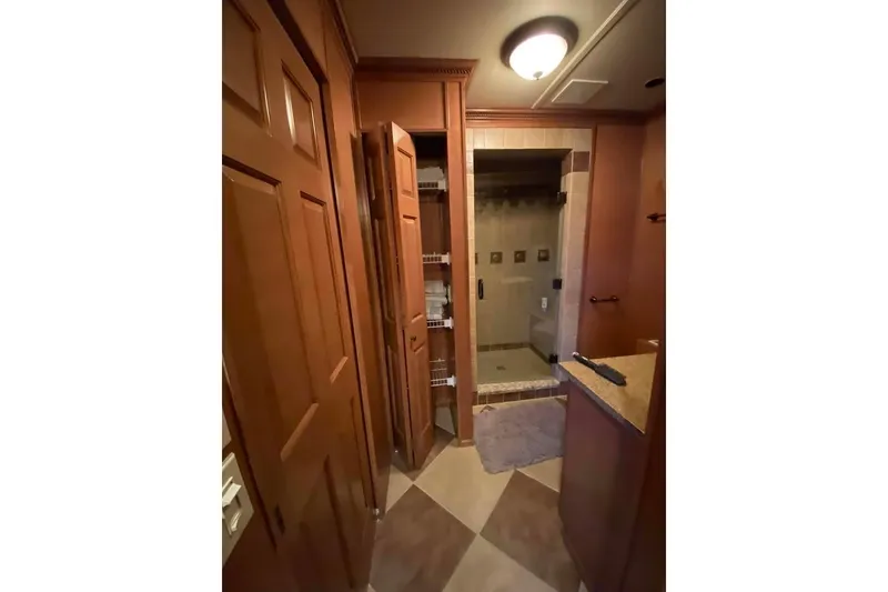 Slide: The Image of Luxurious bathroom in 2007 Summerset model, featuring glass shower and modern fixtures. - 268