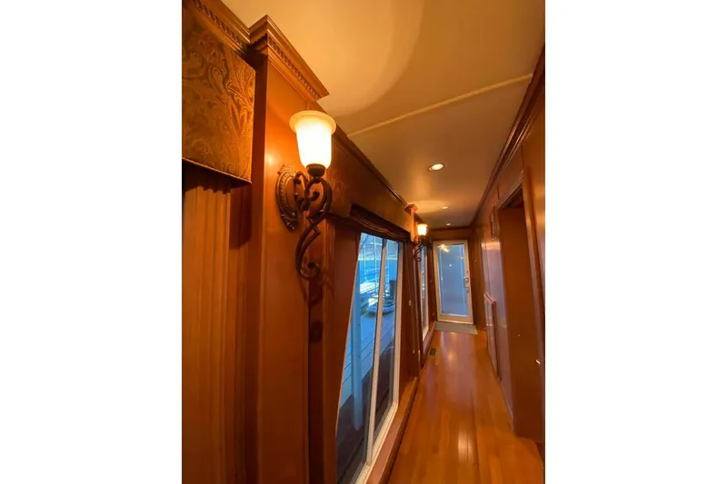 Slide: The Image of Luxurious bathroom in 2007 Summerset 21' x 106' houseboat with glass shower and modern fixtures. - 269