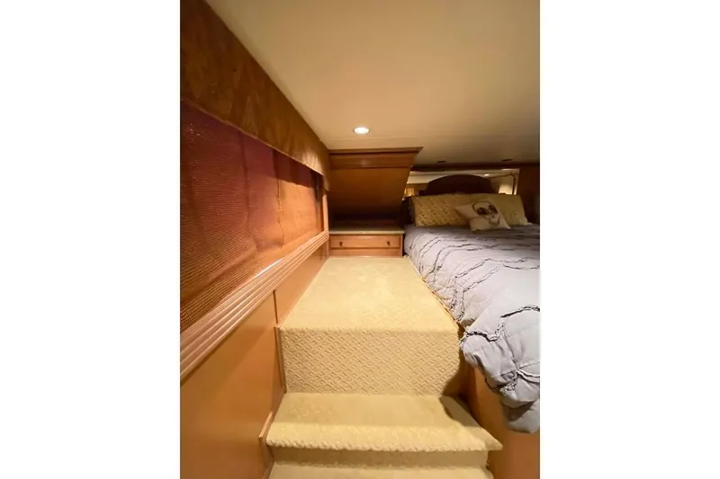Slide: The Image of Interior of 2007 Summerset houseboat with TV, cabinets, and shower. - 280