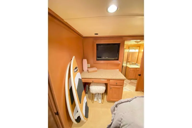 Slide: The Image of Cozy bedroom interior in 2007 Summerset houseboat, featuring carpeted steps and elegant bedding. - 283