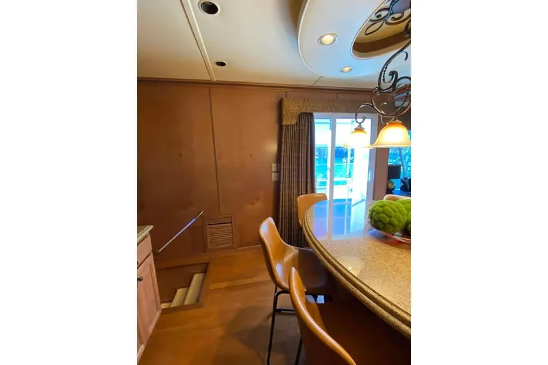 Slide: The Image of Cozy bedroom in 2007 Summerset houseboat with heart-patterned pillow and white bedding. - 304