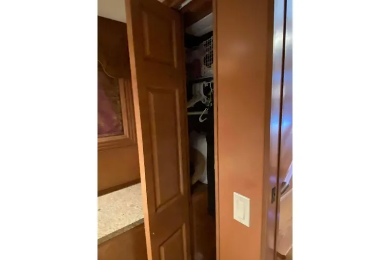 Slide: The Image of Interior of 2007 Summerset model, featuring elegant wood paneling and textured window treatment. - 306