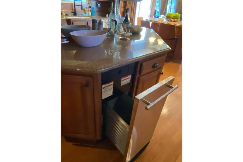 Slide: The Image of Wooden closet door ajar in 2007 Summerset houseboat interior. - 309