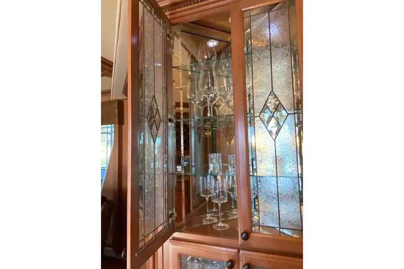 Slide: The Image of Open dishwasher under granite countertop in a modern kitchen, Summerset model 21' x 106', 2007. - 318