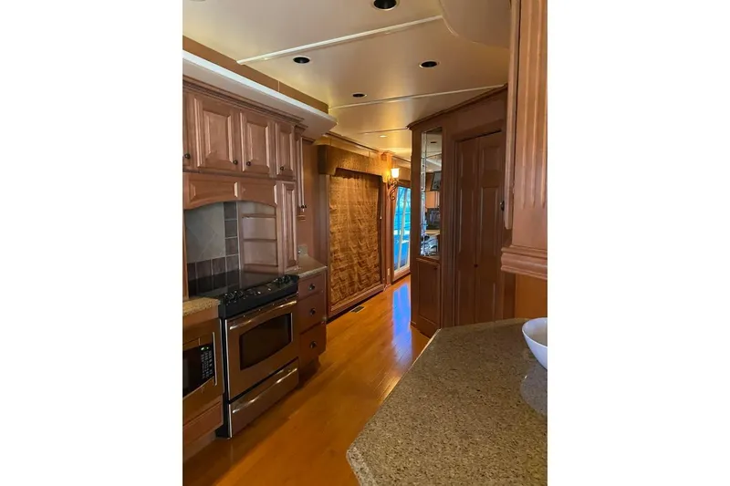 Slide: The Image of Interior of 2007 Summerset houseboat with wall art and cozy decor. - 32