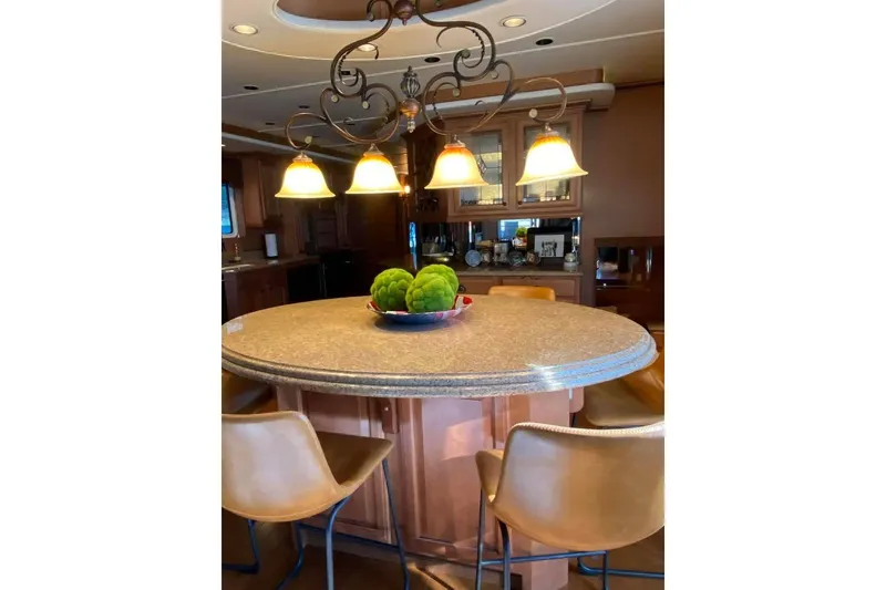 Slide: The Image of Luxurious 2007 Summerset houseboat interior with elegant lighting and cozy seating area. - 323