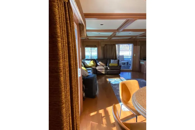 Slide: The Image of Luxurious kitchen interior of 2007 Summerset houseboat with elegant lighting and seating. - 326