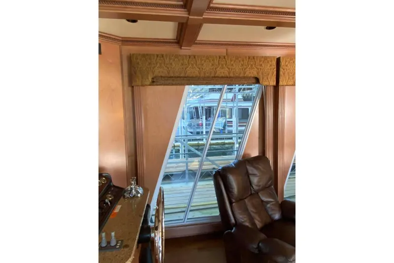 Slide: The Image of Luxurious interior of 2007 Summerset houseboat with leather recliner and large TV. - 331
