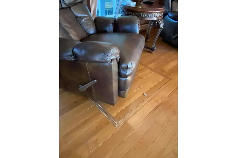 Slide: The Image of Luxurious interior of 2007 Summerset houseboat with elegant curtains and plush seating. - 336