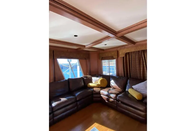 Slide: The Image of Brown leather recliner on wooden floor, Summerset 21' x 106', 2007 model. - 339