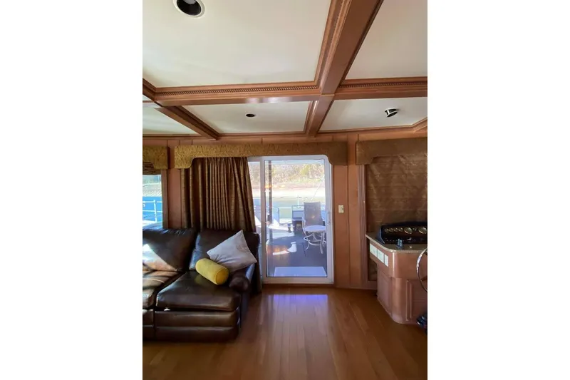 Slide: The Image of Helm of 2007 Summerset 21' x 106' houseboat with steering wheel and control panel. - 345