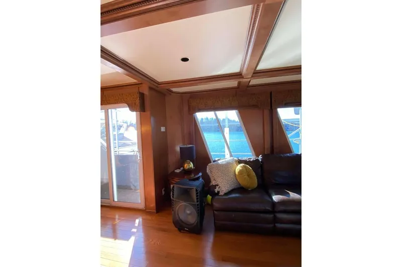 Slide: The Image of Luxurious interior ceiling of a 2007 Summerset houseboat, featuring elegant wood trim. - 346