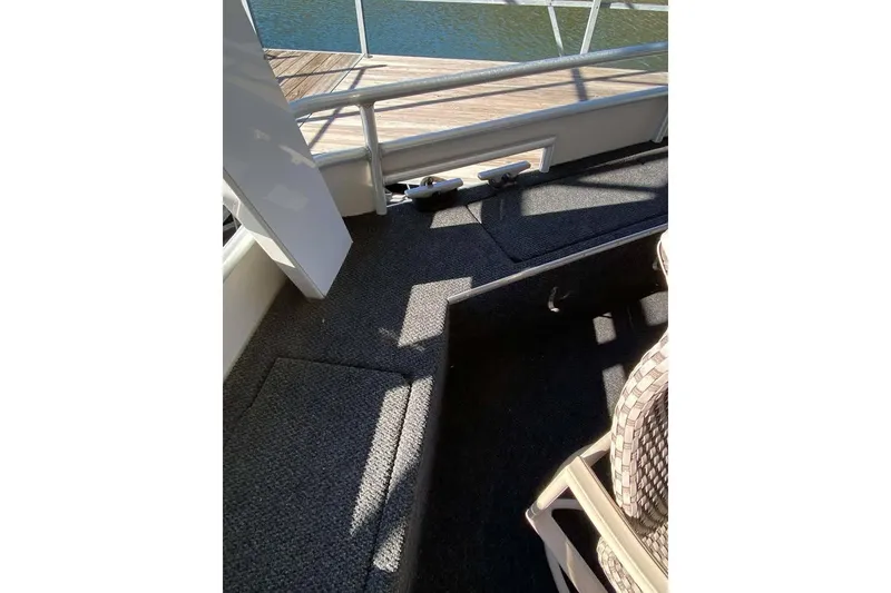 Slide: The Image of Ceiling fan on Summerset 21' x 106' houseboat, 2007 model, with white paneling. - 356