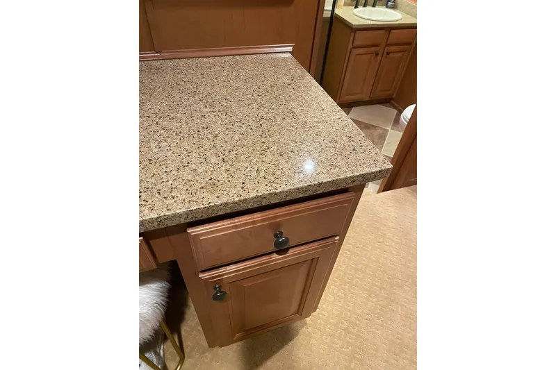 Slide: The Image of Wooden kitchen cabinetry with built-in stove, Summerset 21' x 106', 2007 model. - 36