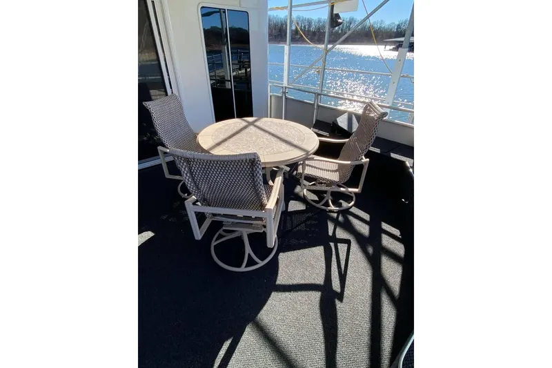 Slide: The Image of Outdoor seating on 2007 Summerset houseboat, overlooking sparkling water. - 363