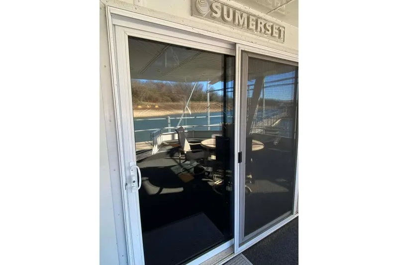 Slide: The Image of Outdoor seating on a 2007 Summerset 21' x 106' houseboat deck. - 368