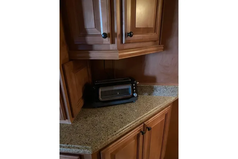 Slide: The Image of Luxurious bathroom in 2007 Summerset model, featuring tiled shower and granite countertop. - 44