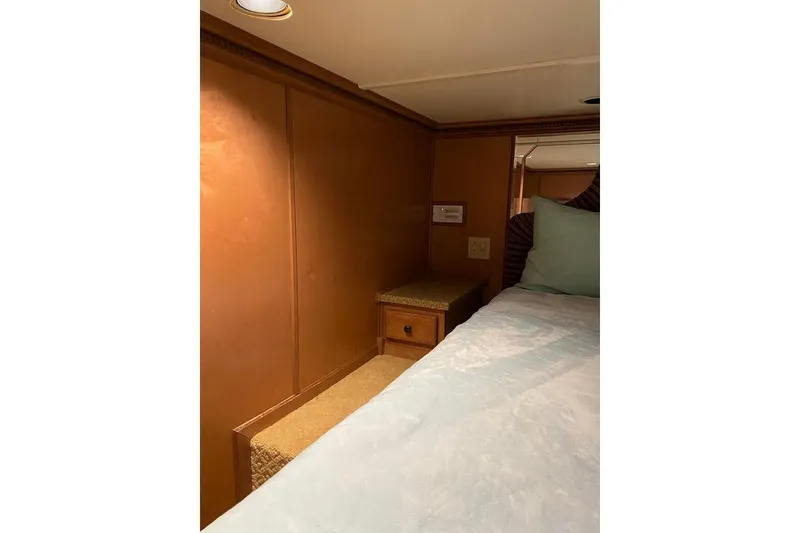 Slide: The Image of Elegant interior of 2007 Summerset model with wood paneling and decorative lighting. - 49