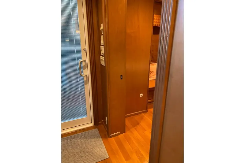 Slide: The Image of Luxurious interior of 2007 Summerset houseboat, featuring elegant wood paneling and modern amenities. - 50