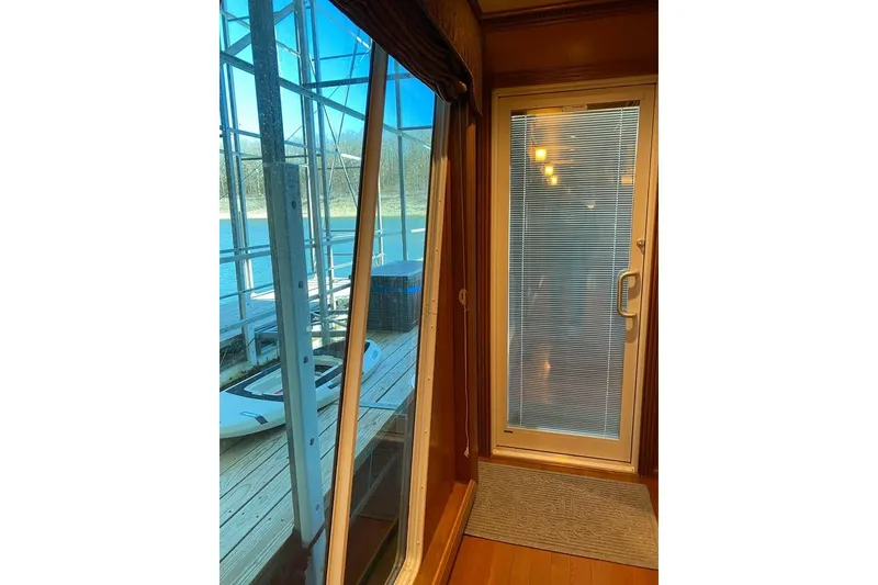 Slide: The Image of Laundry area with modern appliances in a 2007 Summerset 21' x 106' model. - 56