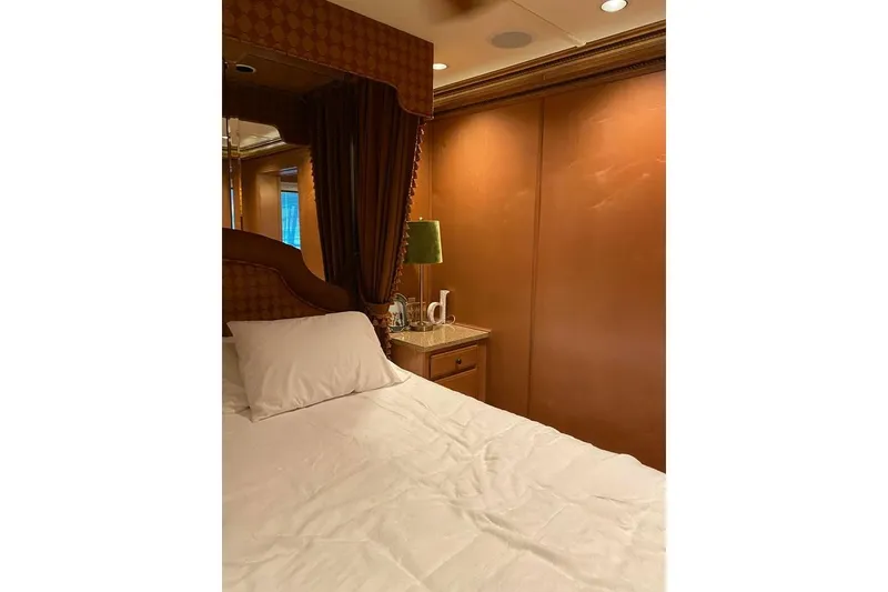 Slide: The Image of Luxurious hallway inside 2007 Summerset houseboat, featuring wooden floors and elegant lighting. - 58