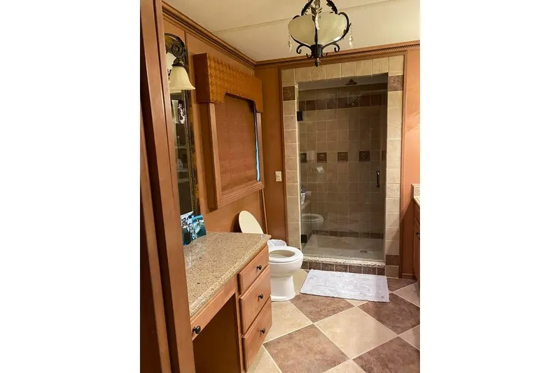 Slide: The Image of Interior view of 2007 Summerset houseboat with sliding glass door and deck access. - 59