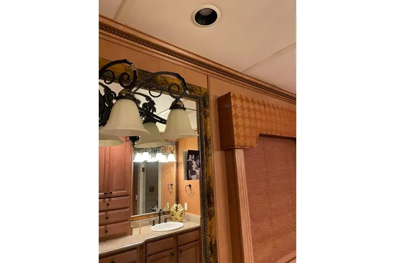 Slide: The Image of Luxurious bedroom interior of 2007 Summerset 21' x 106' houseboat with ceiling fan. - 60