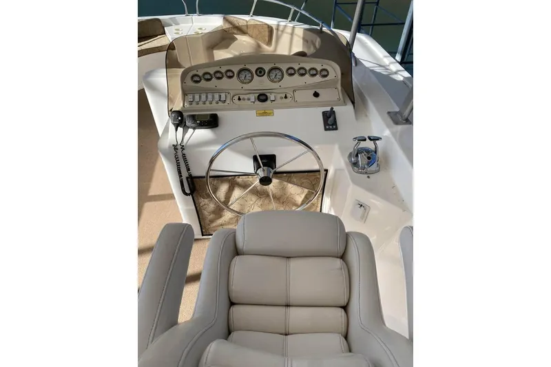 Slide: The Image of Outdoor deck of 2007 Summerset houseboat with lounge chairs and grill. - 68