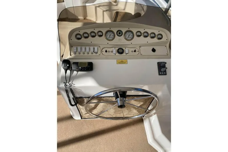 Slide: The Image of Steering console of a 2007 Summerset 21' x 106' boat with leather seating. - 71