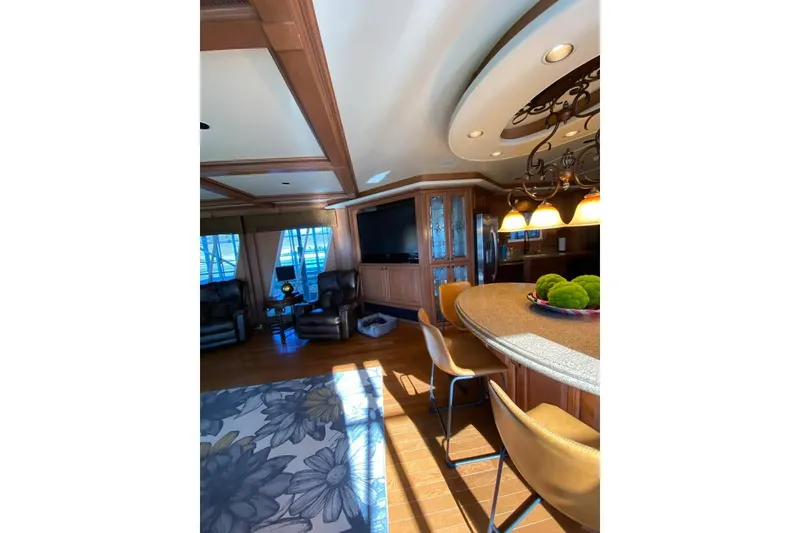 Slide: The Image of Control panel of a 2007 Summerset 21' x 106' boat with steering wheel and gauges. - 74