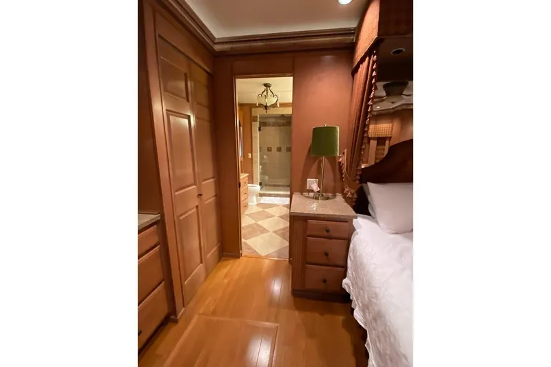 Slide: The Image of Modern kitchen with floral rug, wooden floor, and stylish bar stools. Summerset 21' x 106', 2007. - 9